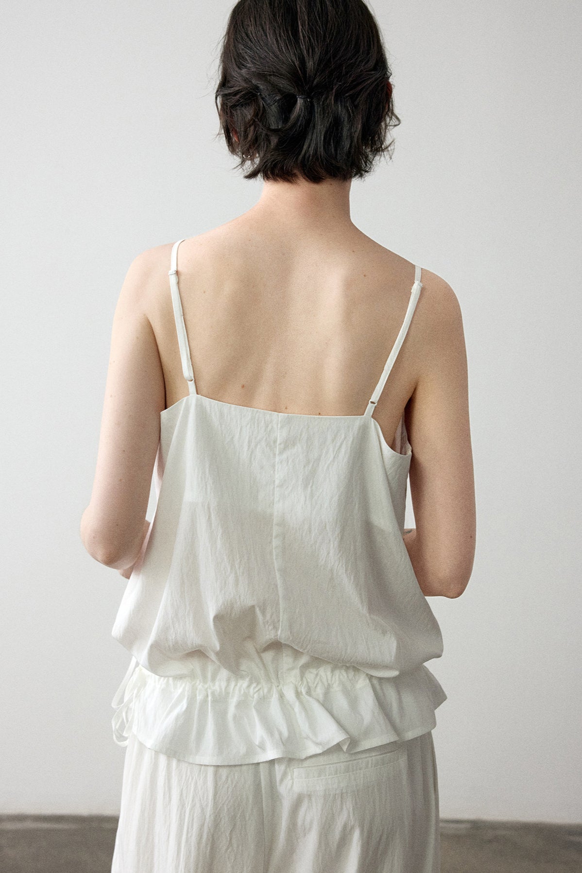 Viscose blend pleated edge sling top
