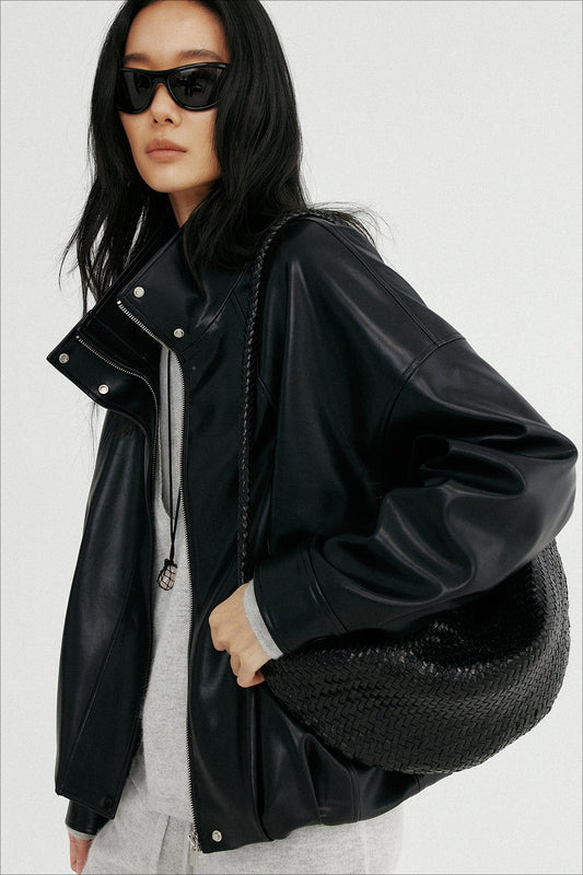 Woman wearing a black leather jacket