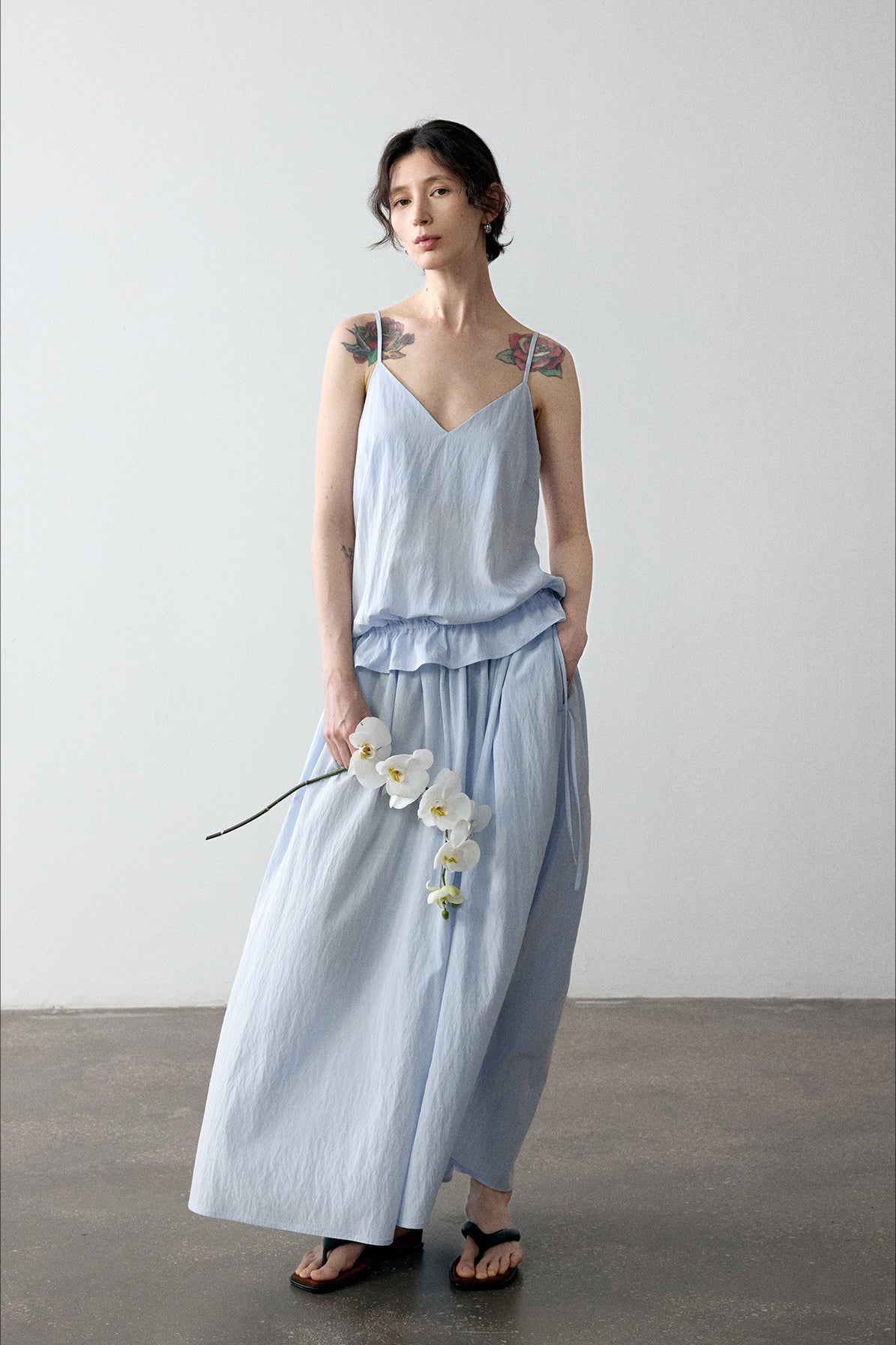 Viscose blend pleated edge sling top