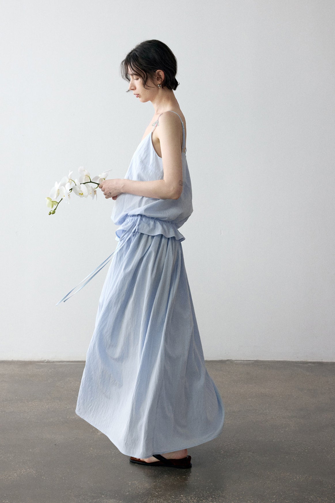 Viscose blend pleated edge sling top