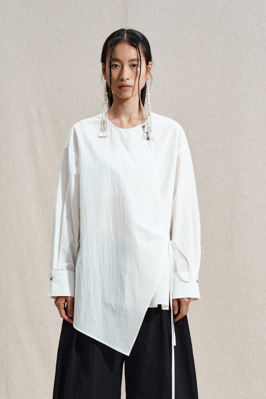 Cotton blend slant opening irregular hem shirt | 2 color