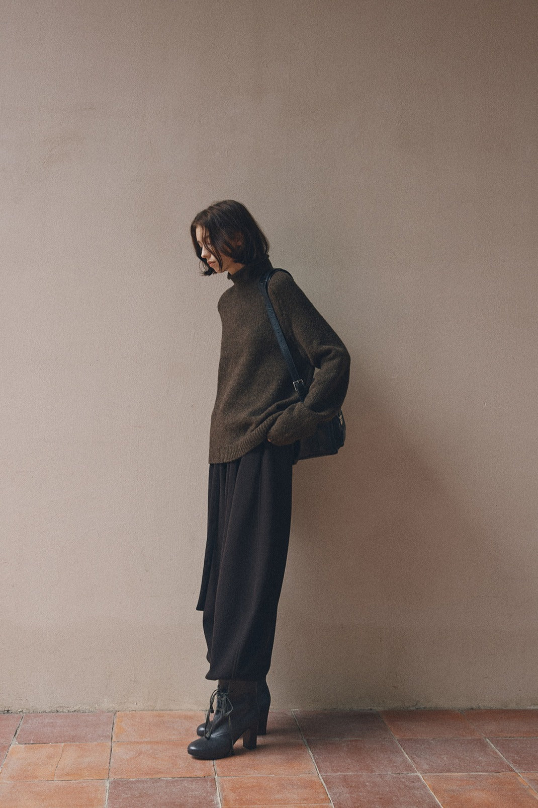 Wool riched rolled high collar cozy sweater
