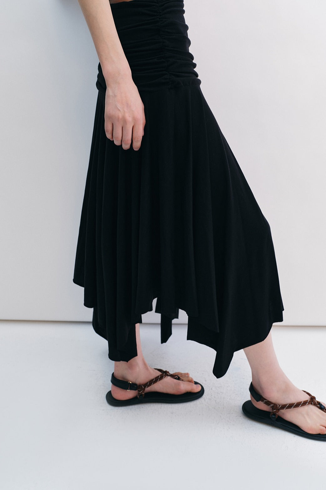Irregular hem draped effect stretchy skirt | 2 color
