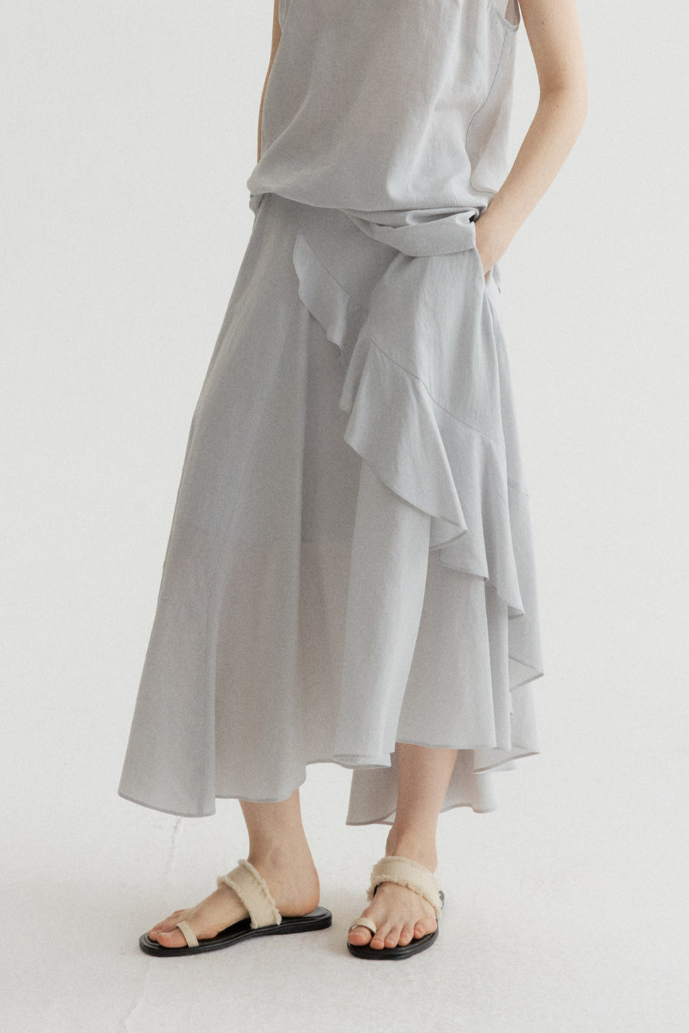 100% lyocell ruffled edge irregular hem soft skirt | 4 color