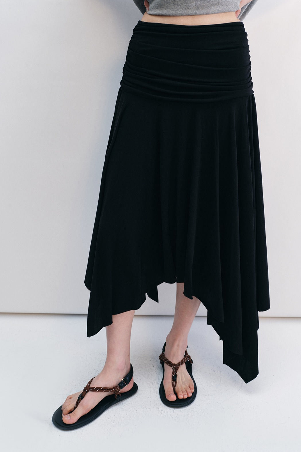 Irregular hem draped effect stretchy skirt | 2 color