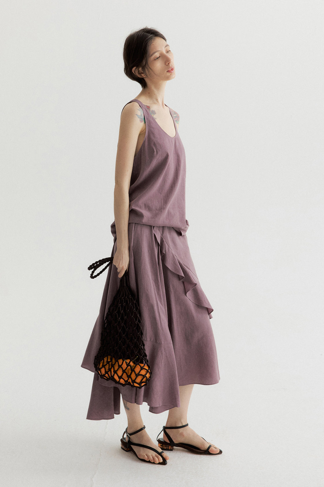100% lyocell ruffled edge irregular hem soft skirt | 4 color