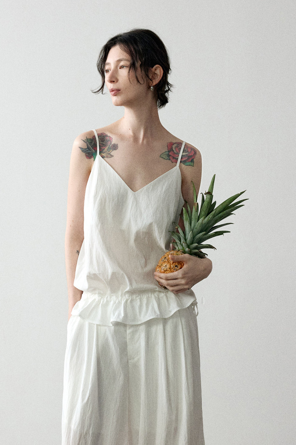 Viscose blend pleated edge sling top