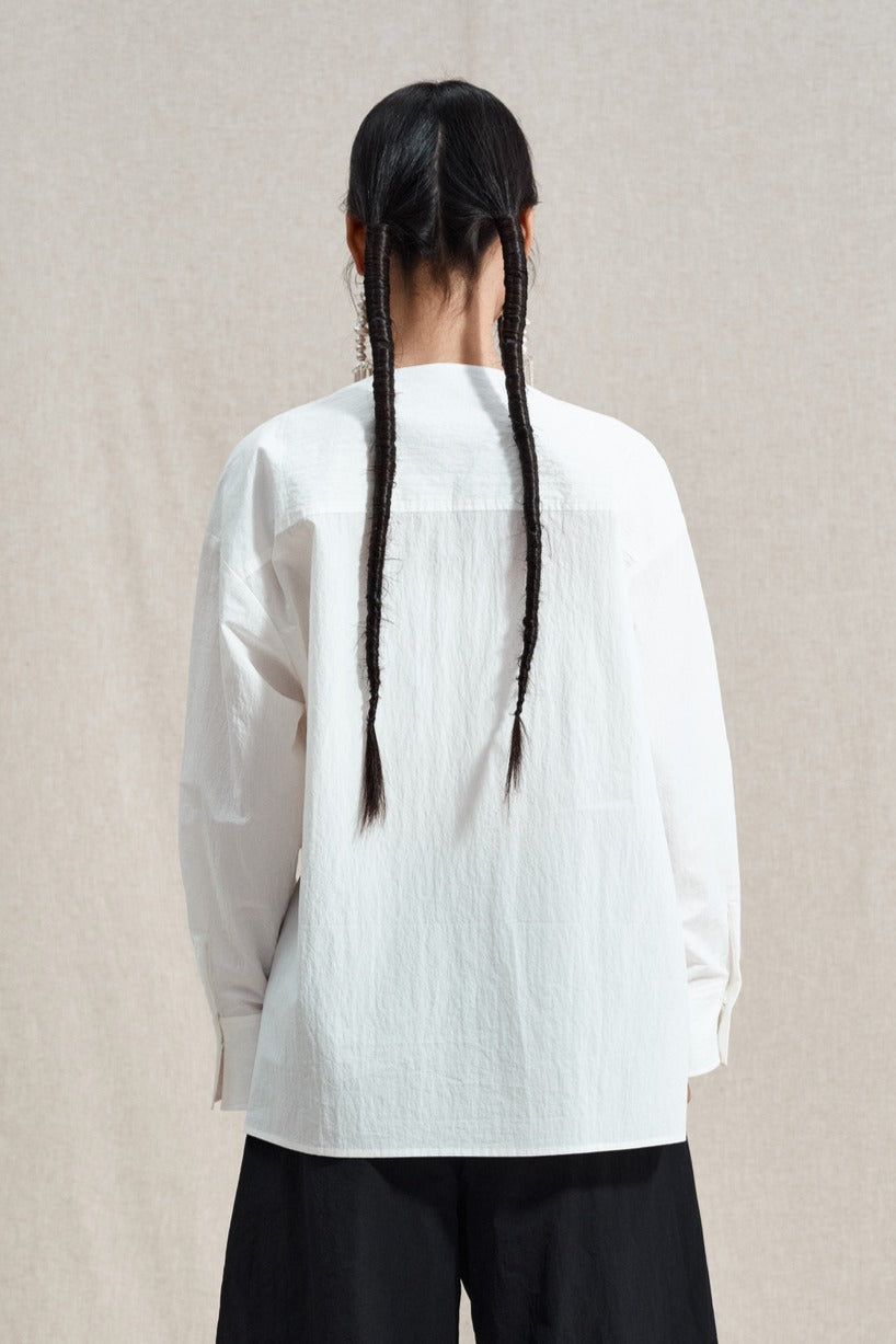 Cotton blend slant opening irregular hem shirt | 2 color