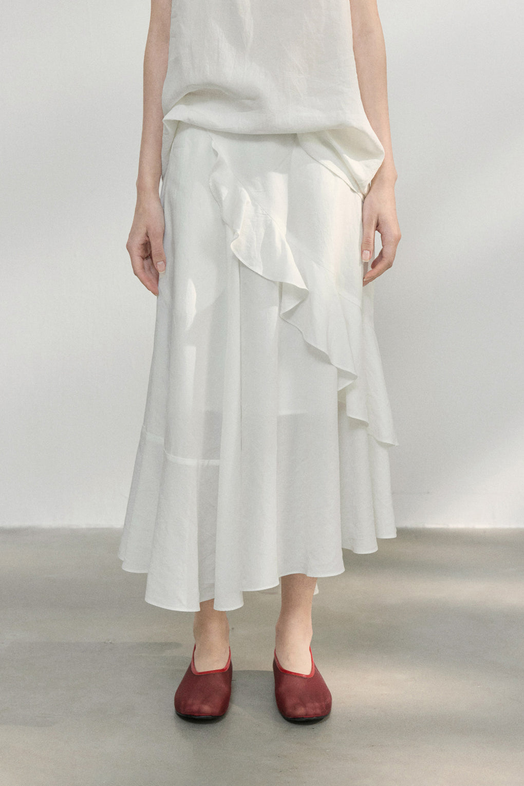 100% lyocell ruffled edge irregular hem soft skirt | 4 color