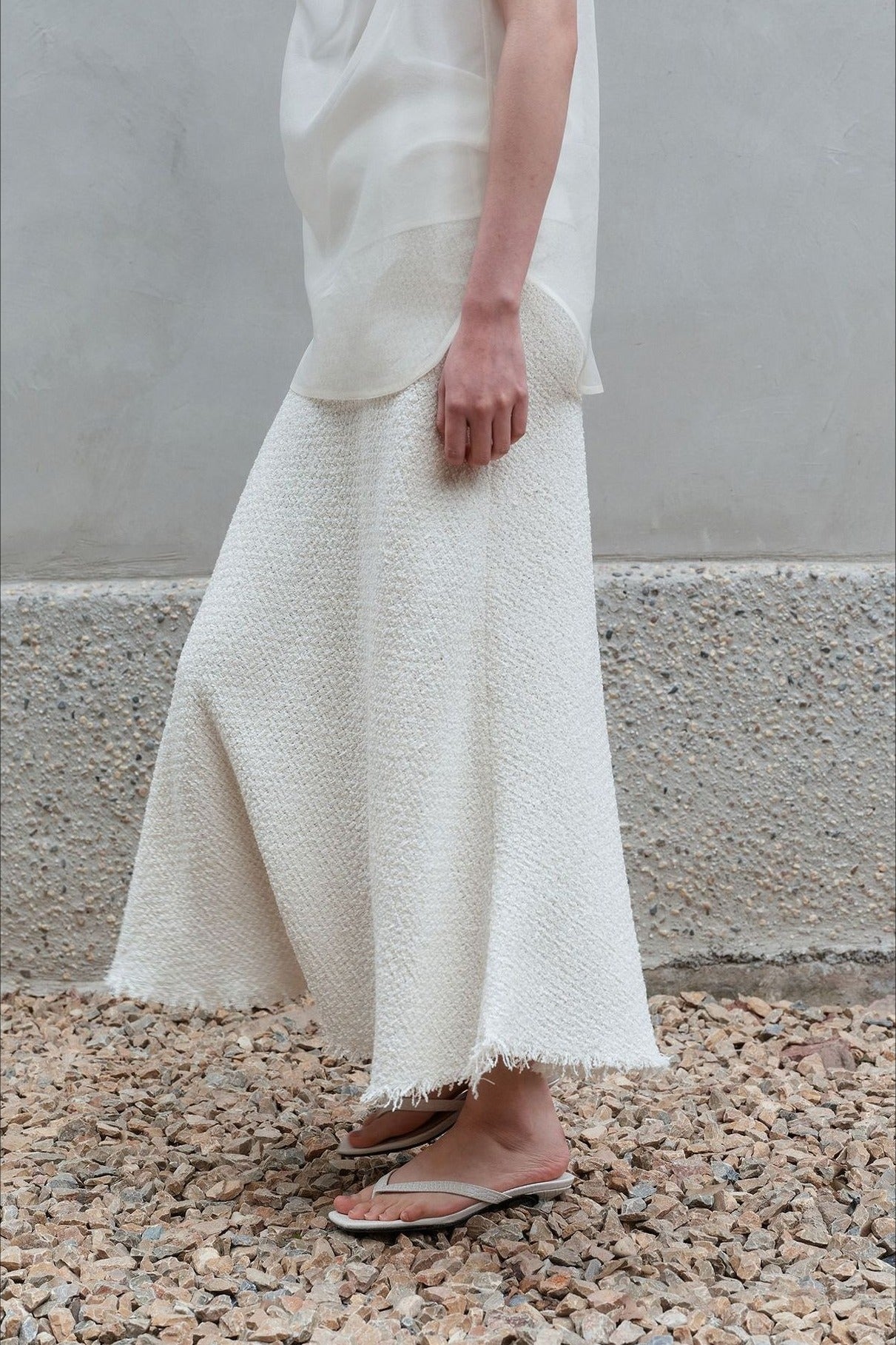 Falda de cola de pez con dobladillo con flecos