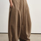 Silhouetted tapered slits hem wide-leg pants | 4 color