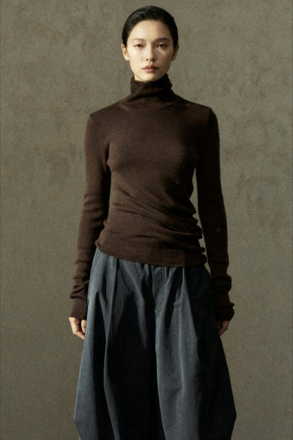 Jersey de cuello alto con bajo irregular, 100% lana | 7 colores