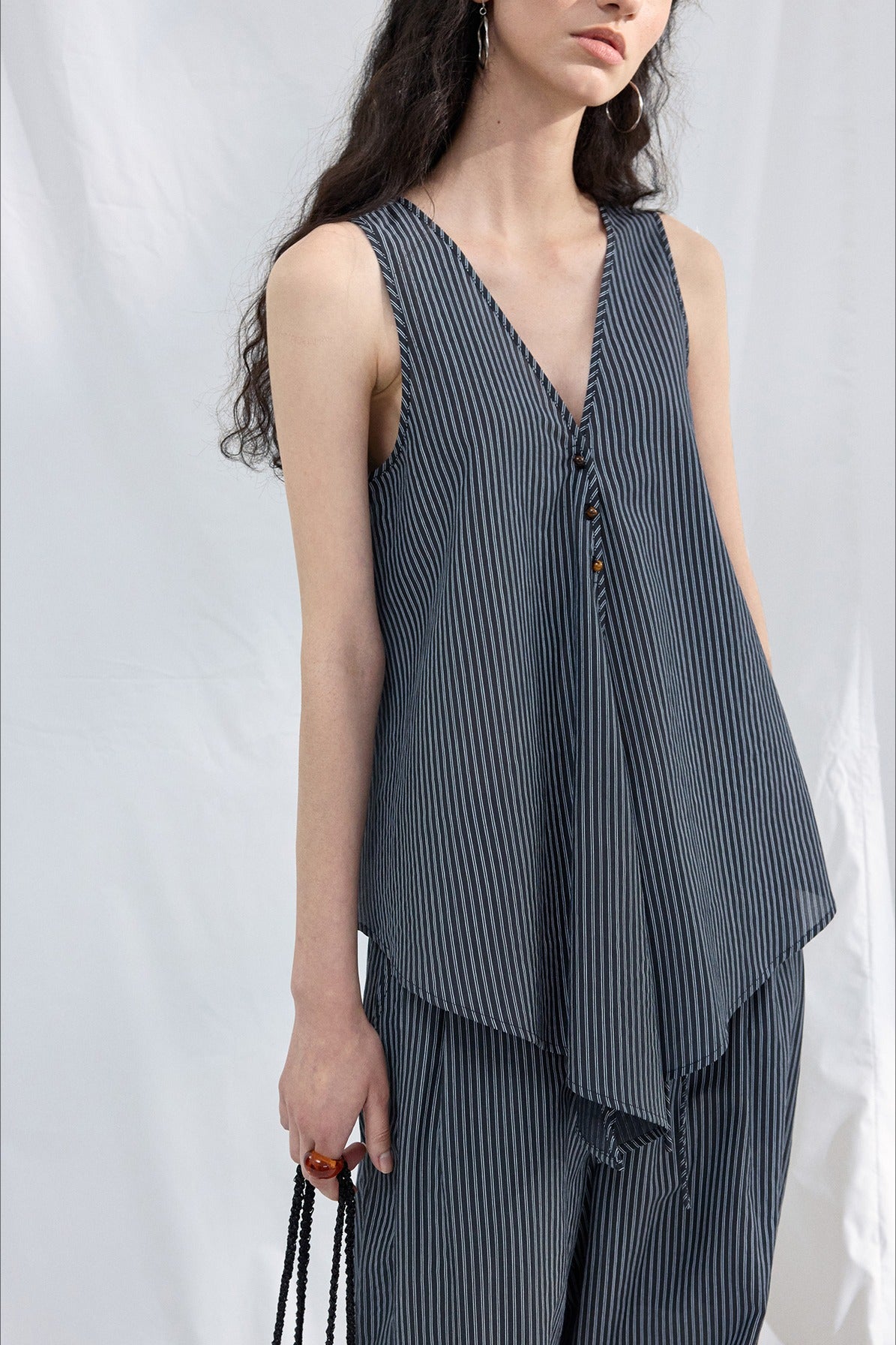 Lyocell blend irregular hemline top | 2 color