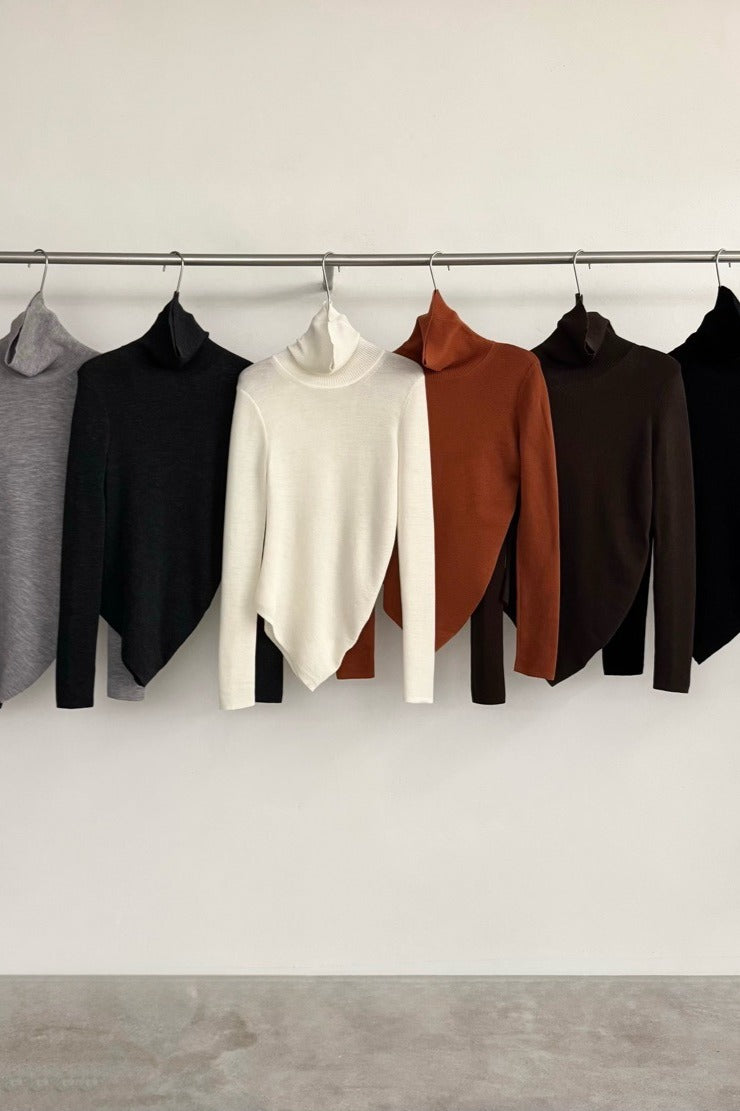 Jersey de cuello alto con bajo irregular, 100% lana | 7 colores